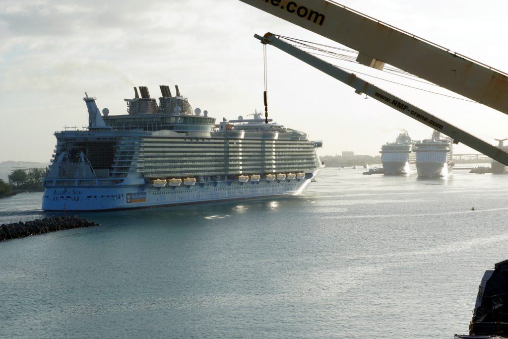 Nassau, Bahamas 11 22 2023: Passenger cruise ship Allure of the Seas approaching port of Nassau in Bahamas which is one of the Caribbean island. In forward other tourist vessels.